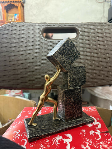 Dynamic Human figure pushing geometric blocks