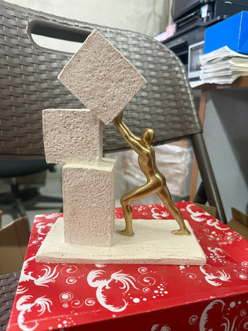 Dynamic Human figure pushing geometric blocks